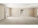 Spacious bedroom with neutral carpeting, multiple windows and natural light at 2 Fieldstone Trl, Englewood, CO 80113