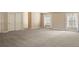 Large bedroom with neutral carpet and ample closet space at 2 Fieldstone Trl, Englewood, CO 80113