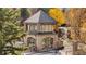 Elegant stone guardhouse featuring classic architectural details and a secure entrance for peace of mind at 2 Fieldstone Trl, Englewood, CO 80113