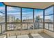 Enclosed patio with large windows that offer ample sunlight and neighborhood views at 13931 E Marina Dr # 402, Aurora, CO 80014