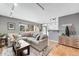 Inviting living room featuring a comfortable sectional sofa and natural light from the large window at 85 N Ogden St # 34, Denver, CO 80218