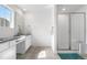 Bathroom features a double sink, shower and tiled floors at 864 Clover Loop, Erie, CO 80026