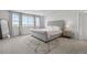 Bedroom boasts a plush rug and many windows at 864 Clover Loop, Erie, CO 80026