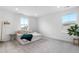 Serene bedroom area with a plush daybed, natural light, and stylish decor, creating a relaxing retreat at 864 Clover Loop, Erie, CO 80026