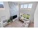 Bright living room with soaring ceilings, large windows, and a comfortable sectional sofa, perfect for relaxation at 864 Clover Loop, Erie, CO 80026
