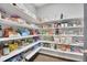 Walk-in pantry with ample shelving, offering lots of storage space for food and essentials at 877 Eldorado Dr, Superior, CO 80027