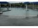 Community pool featuring a unique mushroom shaped structure with trees in the background at 877 Eldorado Dr, Superior, CO 80027