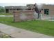 View of Superior Elementary school sign with brick facade and horse statue on a grassy lawn at 877 Eldorado Dr, Superior, CO 80027