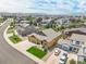 Aerial view of house, neighborhood, and distant mountains at 3995 Manorbrier Cir, Castle Rock, CO 80104