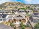 Aerial view of house and neighborhood, showcasing mountain views at 3995 Manorbrier Cir, Castle Rock, CO 80104