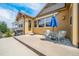 Private backyard patio with seating area and grill at 3995 Manorbrier Cir, Castle Rock, CO 80104