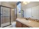Clean bathroom with a shower, toilet and vanity at 3995 Manorbrier Cir, Castle Rock, CO 80104
