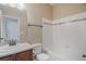 Clean bathroom with tub, shower, and updated vanity at 3995 Manorbrier Cir, Castle Rock, CO 80104