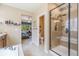 Spa-like bathroom with a shower, soaking tub, and vanity at 3995 Manorbrier Cir, Castle Rock, CO 80104