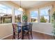 Breakfast nook with table and chairs and a view of the backyard at 3995 Manorbrier Cir, Castle Rock, CO 80104
