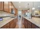 Modern kitchen with granite countertops and stainless steel appliances at 3995 Manorbrier Cir, Castle Rock, CO 80104