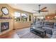 Comfortable living room with sectional sofa and gas fireplace at 3995 Manorbrier Cir, Castle Rock, CO 80104
