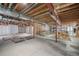 Unfinished basement area with partial framing at 3995 Manorbrier Cir, Castle Rock, CO 80104