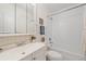 Bright, clean bathroom featuring a vanity with sink, toilet, and shower-tub combo at 2166 S Joplin Way, Aurora, CO 80013