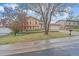 Charming two-story home with a well-manicured front yard, a driveway, and an attached two car garage at 2166 S Joplin Way, Aurora, CO 80013