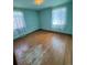 Cozy bedroom with hardwood floors and natural light at 460 Yates St, Denver, CO 80204