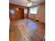 Bedroom with hardwood floors, built-ins, and natural light at 460 Yates St, Denver, CO 80204