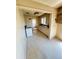 Dated kitchen featuring an oven, cabinets, and a small window above the sink at 460 Yates St, Denver, CO 80204