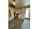 Laundry room with washer, dryer, water heater, and utility sink at 460 Yates St, Denver, CO 80204