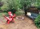 Tranquil backyard featuring outdoor furniture and a fire pit at 943 Pinon Ct, Longmont, CO 80504