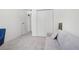 Cozy bedroom with a daybed, plush carpet, and closet space for storage at 943 Pinon Ct, Longmont, CO 80504