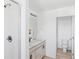 Clean bathroom featuring a tiled shower, a vanity with modern fixtures, and a separate toilet room at 6117 Easton Cir, Frederick, CO 80504