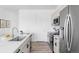 Contemporary kitchen with sleek appliances, stylish countertops, and modern cabinetry at 6117 Easton Cir, Frederick, CO 80504