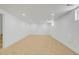 Spacious basement area with carpet and ample natural light at 3055 S Winona Ct, Denver, CO 80236