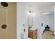 Well-lit bathroom features modern fixtures and a tiled glass shower at 3055 S Winona Ct, Denver, CO 80236