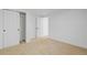 Bedroom with neutral carpet and double closets, providing ample storage and organization space at 3055 S Winona Ct, Denver, CO 80236