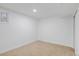 Bedroom featuring a window and white walls at 3055 S Winona Ct, Denver, CO 80236