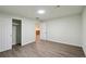 This finished basement offers hardwood floors and neutral walls at 3746 S Fairplay Way, Aurora, CO 80014