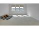 Sunlit bedroom featuring multiple windows, creating a bright and airy atmosphere at 11299 Star Streak Ln, Littleton, CO 80125