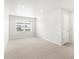 Spacious bedroom with ample natural light and neutral carpeting at 754 N Tempe St, Aurora, CO 80018