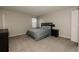 Neutral bedroom featuring a Queen bed, carpet, and 1 window with neutral walls at 431 Wright St # 203, Lakewood, CO 80228