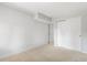 Bright bedroom with carpeted floors, trim, and neutral walls at 12674 E Bates Cir, Aurora, CO 80014