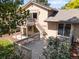 Charming two-story home with a spacious deck, wood railings, and a view of lush landscaping at 12674 E Bates Cir, Aurora, CO 80014