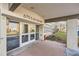 Building entrance featuring double glass doors and 675 S Alton Way address at 675 S Alton Way # 7A, Denver, CO 80247