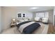 Inviting main bedroom with great natural light, soft carpeting, and modern furnishings at 675 S Alton Way # 7A, Denver, CO 80247