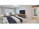 Inviting main bedroom with great natural light, soft carpeting, and modern furnishings at 675 S Alton Way # 7A, Denver, CO 80247