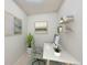 Cozy office with light walls, natural light, a work desk, and decorative wall art at 675 S Alton Way # 7A, Denver, CO 80247