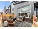Inviting patio with a fire pit and comfortable seating, perfect for outdoor entertaining and relaxation at 9487 W 58Th Ln # C, Arvada, CO 80002