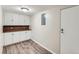 Basement storage area with cabinets and ample space at 1070 Race St # H, Denver, CO 80206