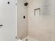 Modern bathroom with sleek shower and built in tile shelving at 1070 Race St # H, Denver, CO 80206