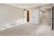 Spacious bedroom featuring neutral walls and plush carpeting at 1070 Race St # H, Denver, CO 80206